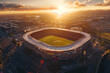 An aerial view of a sports stadium during sunset