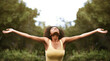 © Mapodile M/peopleimages.com - Relax, open arms and black woman in park for freedom, adventure and fresh air in nature. Happy, excited and person with happiness, positive attitude and joy outdoors for holiday, vacation and weekend