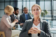 © Katsiaryna - confident business woman looking at camera in modern office