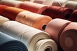 A close up of a bunch of rolls of fabric. Ideal for textile industry concepts