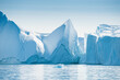 Big icebergs in Atlantic ocean, Ilulissat icefjord, western Greenland.