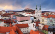Panorama of Brno skyline with castle Spilberg, main square and cathedral Petrov at dramatic sunset. Czech Republic