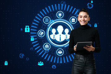 Poster - Happy businesswoman using tablet with creative business hologram with people icons on blue background with various icons. HR, human resources and online recruiting concept.