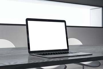 Poster - Close up of white mock up laptop screen on wooden office desk. Workplace and technology concept. 3D Rendering.