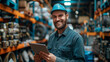 © Zemon - Smiling professional technician holding tablet in hand