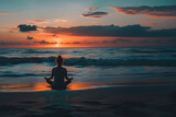 Fototapeta  - a girl meditates in the lotus position against the backdrop of the sea and sunset, A woman does yoga on the beach against the backdrop of sunse