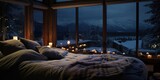 Fototapeta  - On a cold winter night, a cozy bed with fluffy pillows is framed by a large window that overlooks a serene snow-covered landscape, providing an inviting and peaceful refuge from the world outside