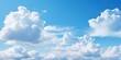 Beautiful blue sky and white cumulus clouds abstract background. Cloudscape background. Blue sky and fluffy white clouds on sunny days. Blue sky and daylight.