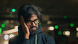 © Yuliia - Close up shocked stressed Arabian unhappy bearded man in glasses guy wave head no negative emotion disbelief stress anxious worried at parking lot depressed Indian male divorce job loss reaction