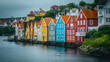 Colorful houses perched along the waterfront background