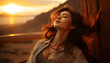 cute asian young woman with closed eyes basking in the sunset rays.