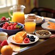 wooden table spread with breakfast 