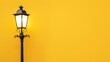 Close up classic retro street lamp with copy space on yellow background.