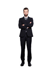 Poster - Full size fullbody portrait of  virile harsh business person in black suit with tie having his arms crossed, isolated on grey background