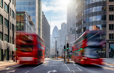 Wall Mural - Long exposure view of Liverpool Street in the City of London with bus traffic and office skyscrapers in the background