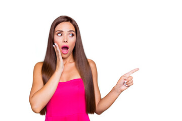 Canvas Print - Close up studio photo portrait of amazed shocked surprised scared terrified with open mouth lady pointer showing on copy space holding hand near mouth isolated bright background