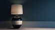 A lamp, glazed in black and white, with a sharp and clever humor style, in light beige and navy.
