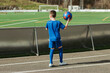 © ADDICTIVE STOCK - Young player preparing for soccer match