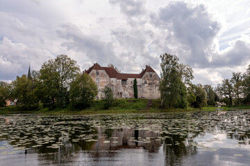 Wall Mural - Jaunpils castle was built in 1301. as Livonia Order fortress. Latvia, aerial drone view