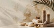 Cosmetic accessories for spa treatments on a beige background. Light atmosphere, candles, massage stones, essential oils and sea salt. The concept of beauty and health care. 
