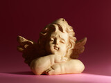 Fototapeta  - statue of a angel lighted by sunbeam