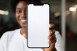 Close up of black woman hand showing smartphone mockup at home