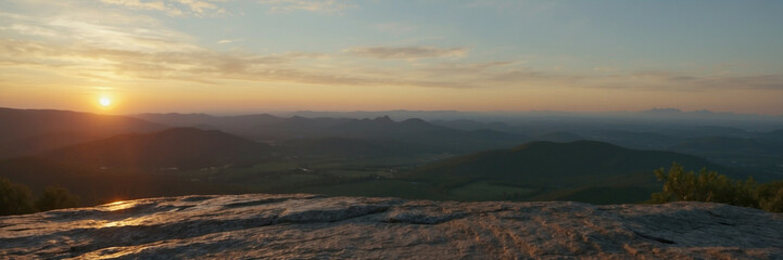 Canvas Print - Sun Setting Over Distant Mountains