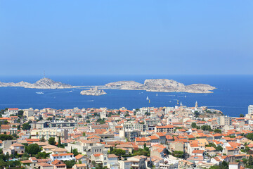 Wall Mural - Townscape and many boats sail near IF island at sunny summer day in Marseille, France