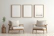 © usman - Beige Scandinavian sofa chair with a white blank frame against a soft wall.