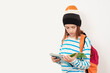 Back to school. Boy in casual clothes with books for studing. School boy with backpack holding books. Education concept.