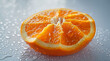 Close-up of a juicy orange slice with water droplets, reflecting freshness and vitality.
