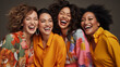 Ecstatic Women Enjoying a Heartfelt Laugh Together. Group of stylish women in chic dresses laugh wholeheartedly, exuding positivity and strong bonds of friendship in an elegant setting.