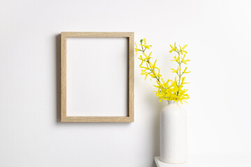 Wall Mural - Blank wooden frame mockup on white wall