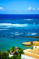 Wall Mural - Tropical seascape aerial landscape in San Juan, Puerto Rico over La Poza del Escambrón Beach and Escambron Beach