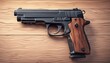 Classic handgun on wooden background