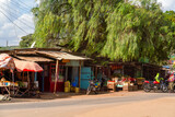 Fototapeta Sypialnia - Roadside shops and stalls in Kenyan village