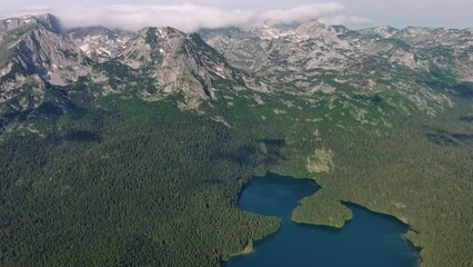 Wall Mural - aerial view of famous black lake in mountain durmitor park at summer, montenegro, 4k