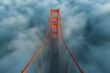 The iconic Golden Gate Bridge reaching above the clouds in a breathtaking aerial view.