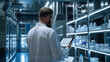 © Shivart - Backshot of a scientist using tablet in laboratory
