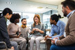 © Mediteraneo - Group of people sitting in a circle are participating in a support meeting. Healthcare and medicine concept. Crying.