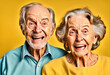 Portrait of beautiful elderly couple. Concept of fun and happiness. Eyes and mouth wide open