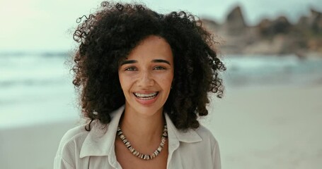 Poster - Face, smile and woman on beach to relax for travel, holiday or vacation on tropical coast. Portrait, summer and happy young person on island by ocean or sea for fresh air and weekend getaway