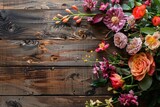 Fototapeta Las - Floral arrangement on wooden background