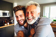 © petro - Adult hipster son fun hugging old senior father at