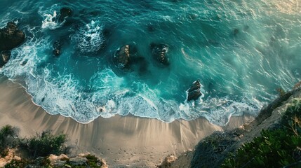 Leinwandbilder - Scenic aerial view of a beach with rocks, perfect for travel websites or nature publications.