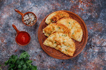 Wall Mural - Traditional Russian deep fried meat pies - chebureki.