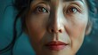 A China old woman's face is using a high-tech arm to beautify wrinkles with a laser.