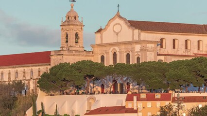 Wall Mural - The Miradouro Sophia de Mello Breyner Andresen old Miradouro da Graca evening timelapse. Located in the parish of Sao Vicente, in the former church of the Convent of Grace in Lisbon, Portugal.