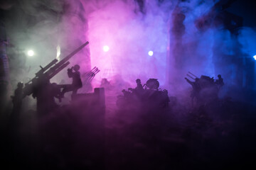 Wall Mural - War Concept. Military silhouettes fighting scene on war fog sky background, World War Soldiers Silhouette Below Cloudy Skyline At night. Battle in ruined city.