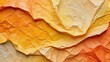 Crumpled paper texture, strokes of yellow and orange aquarelle paints, blending of hues, softened edges, watercolor on textured surface, abstract background, close-up perspective, high-resolution